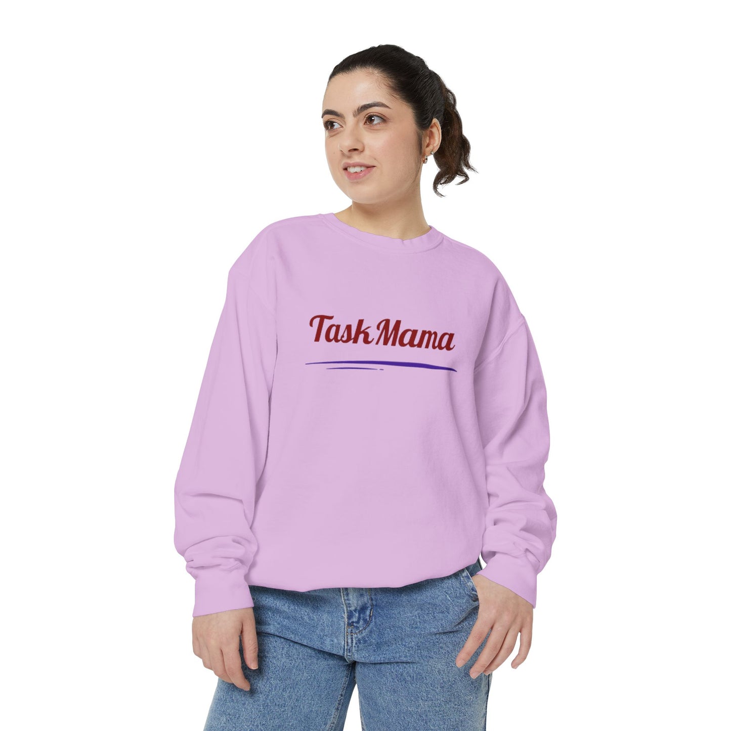 Woman wearing a light purple sweatshirt with 'Task Mama' text on a white background