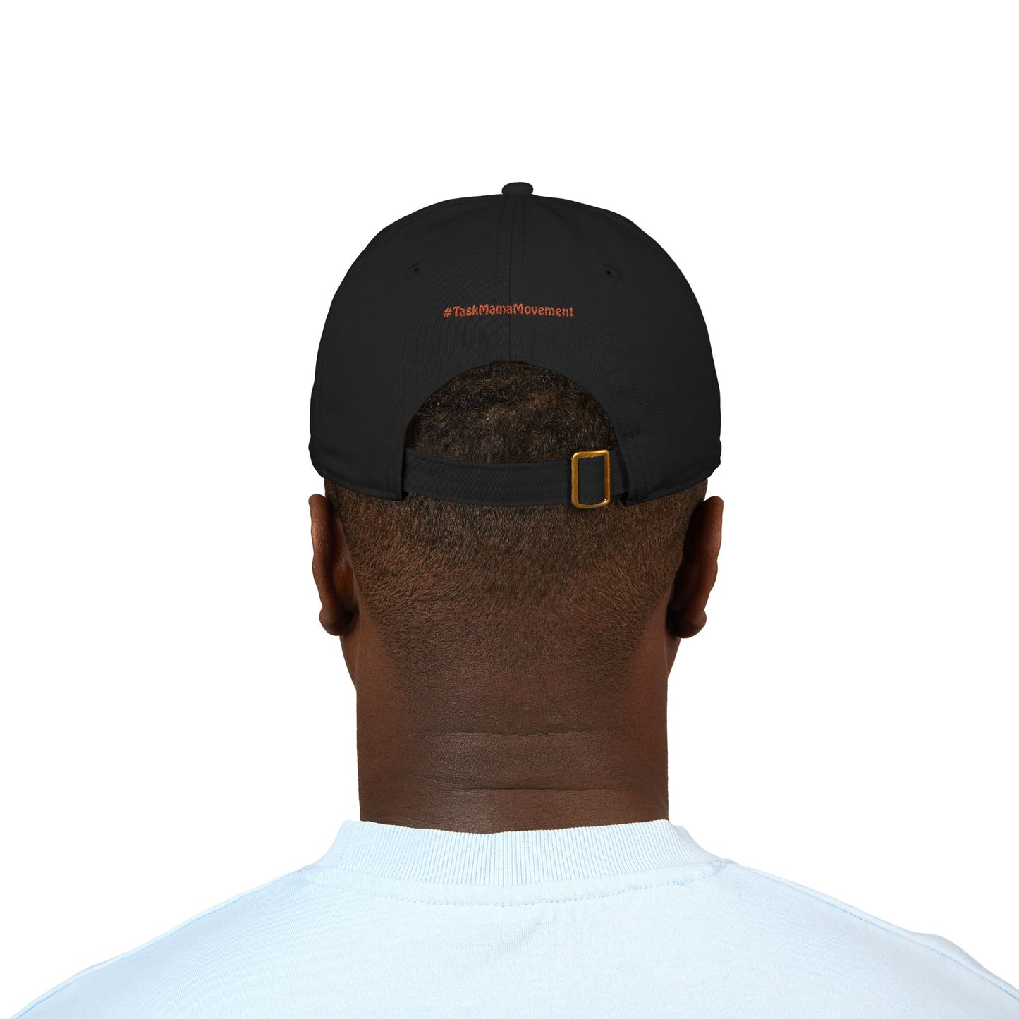 Black cap worn by a person on a white background