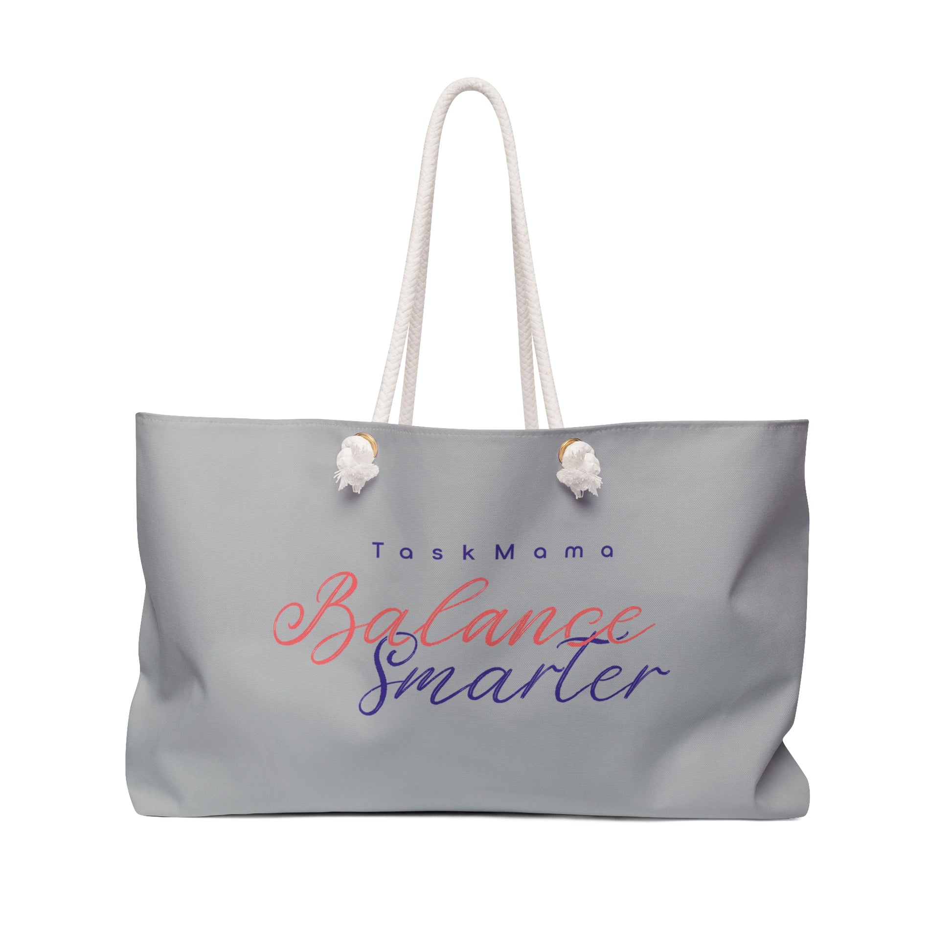 Gray tote bag with 'Task Mama Balance Smarter' text on a white background