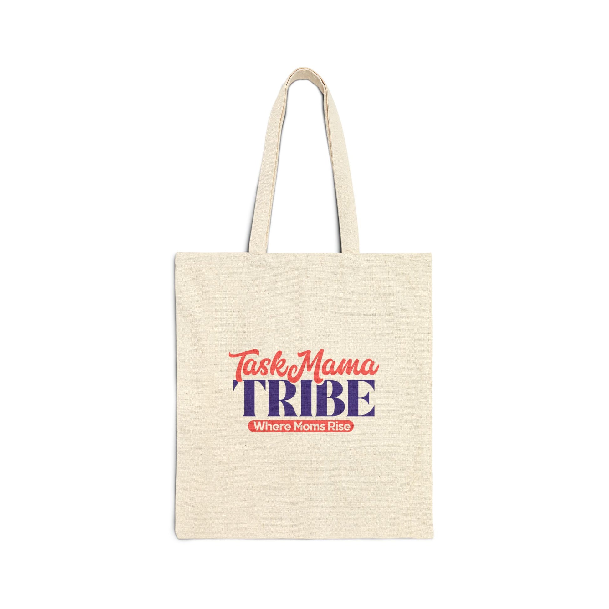Beige tote bag with 'Task Mama Tribe' text on a white background