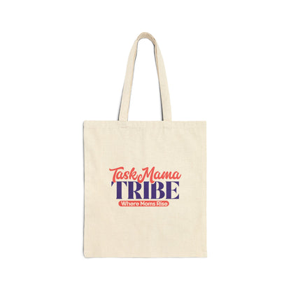 Beige tote bag with 'Task Mama Tribe' text on a white background
