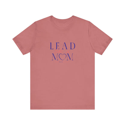 Pink t-shirt with 'L.E.A.D MOM' text in purple on a white background