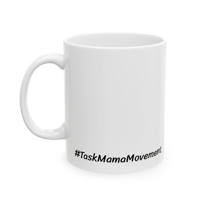 White mug with '#TaskMamaMovement' text on a white background