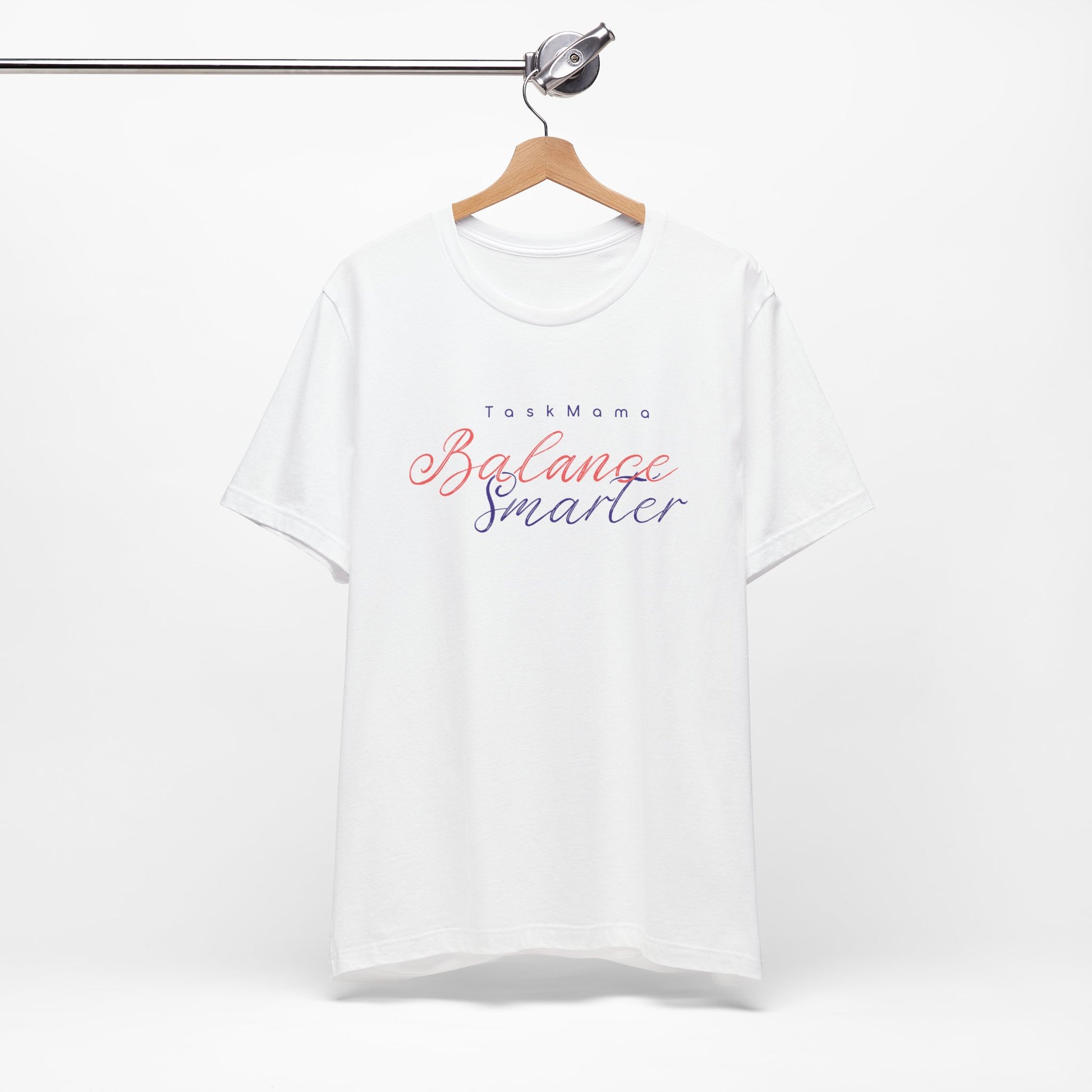 White t-shirt with 'Balance Smarter' text on a hanger against a white background
