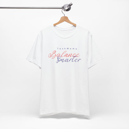 White t-shirt with 'Balance Smarter' text on a hanger against a white background