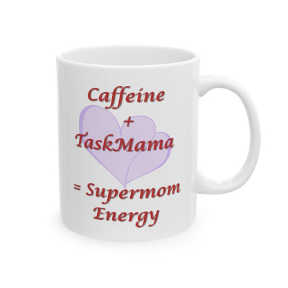 White mug with text 'Caffeine + TaskMama = Supermom Energy' and a purple heart on a white background