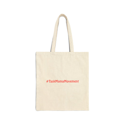 Beige tote bag with red text '#TaskMamaMovement' on a white background