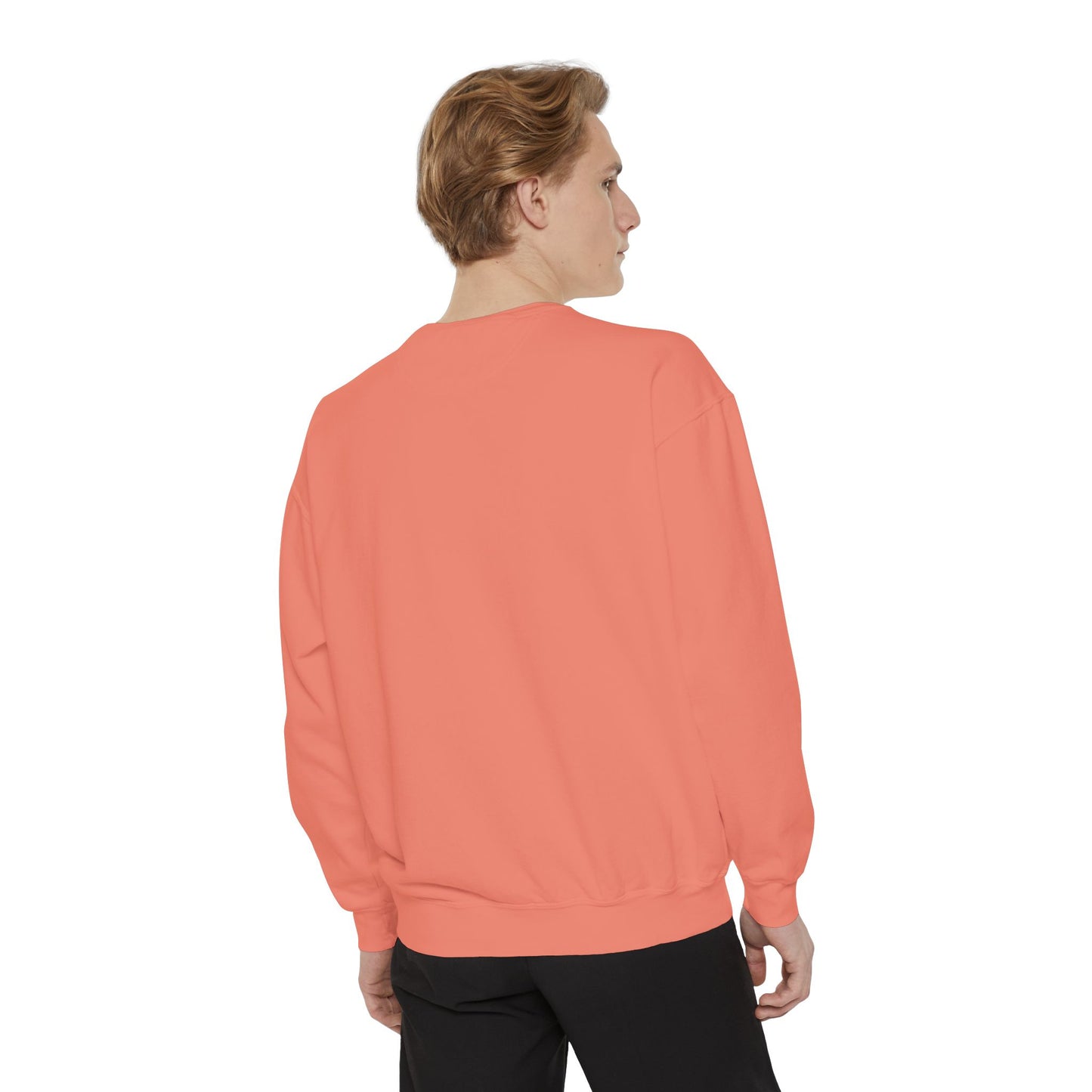 Person wearing a coral sweatshirt on a white background