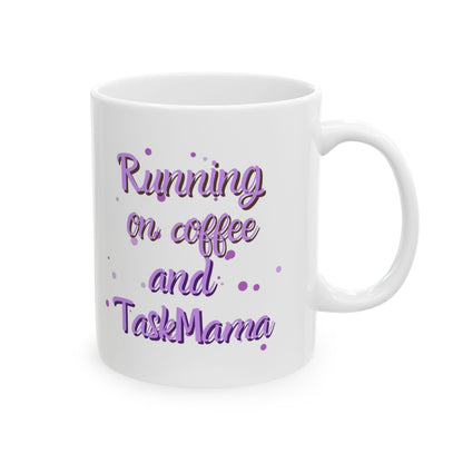 White mug with purple text 'Running on coffee and TaskMama' on a white background