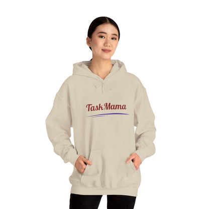 Person wearing a beige hoodie with 'Task Mama' text on a white background