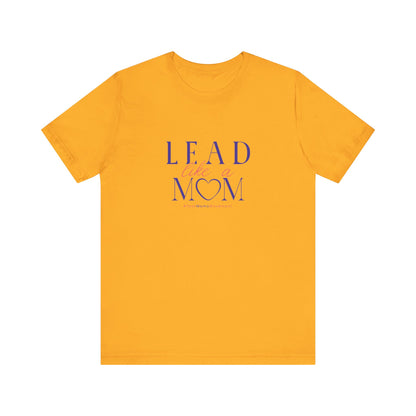 Yellow t-shirt with 'Lead Like a Mom' text on a white background