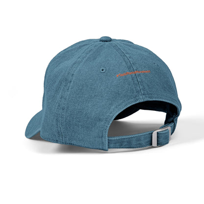 Blue cap with a logo on the back against a white background
