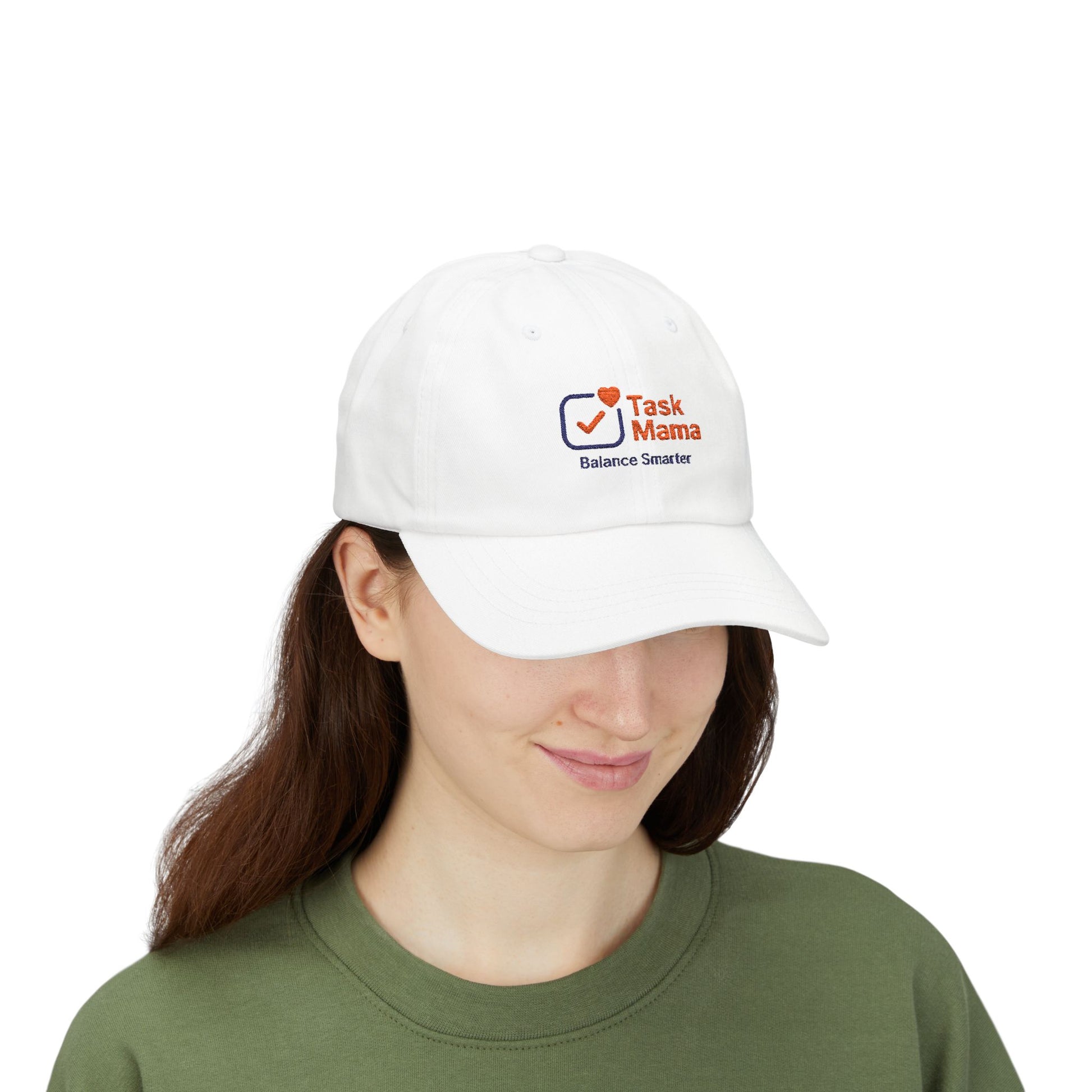 Person wearing a white cap with 'Task Mama' logo on a white background