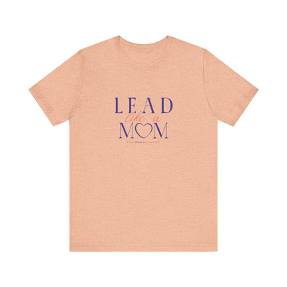 Beige t-shirt with 'Lead Like a Mom' text on a white background