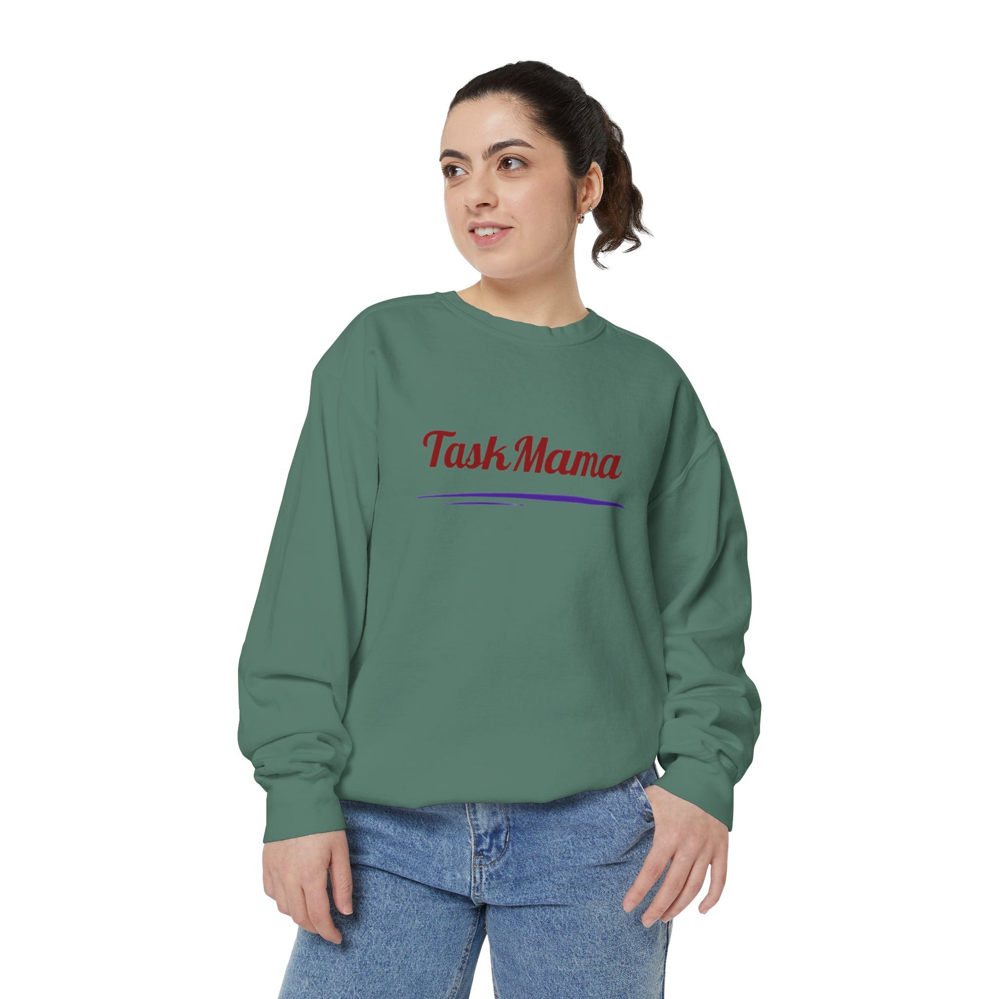 Person wearing a green sweatshirt with 'Task Mama' text on a white background