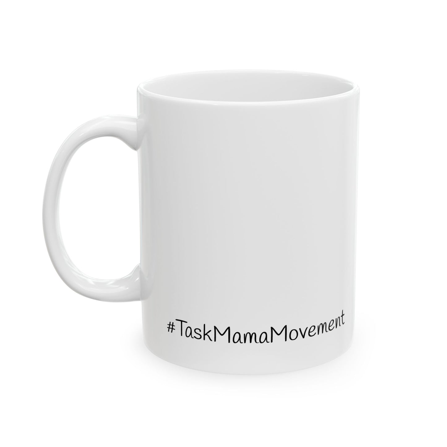 White mug with '#TaskMamaMovement' text on a white background