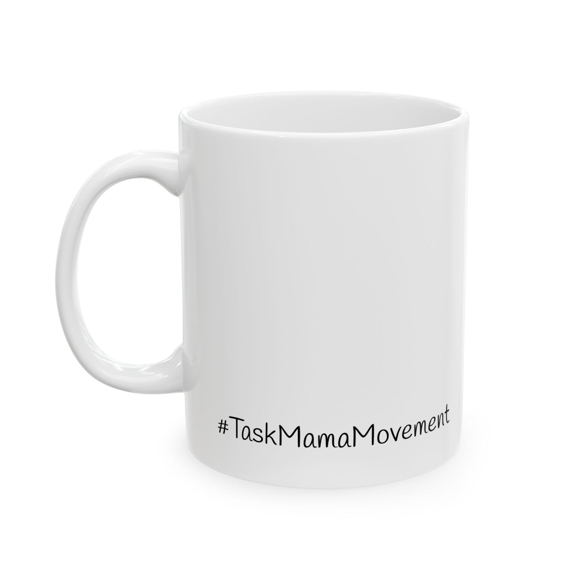 White mug with '#TaskMamaMovement' text on a white background
