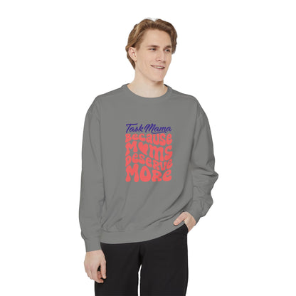 Person wearing a gray sweatshirt with colorful text on a white background