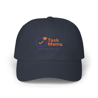 Navy blue cap with 'Task Mama' logo on a white background