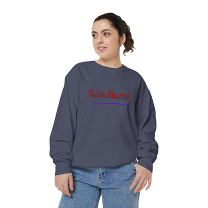 Woman wearing a navy sweatshirt with 'Fash Mama' text on a white background