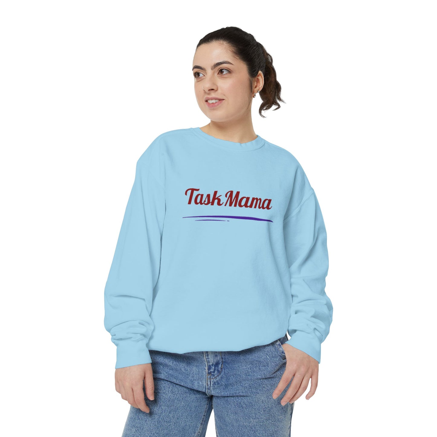 Woman wearing a light blue sweatshirt with 'Task Mama' text on a white background