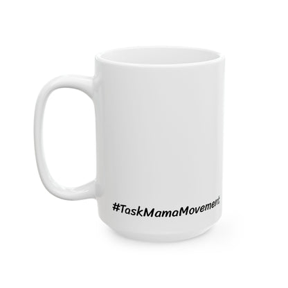 White mug with '#TaskMamaMovement' text on a white background