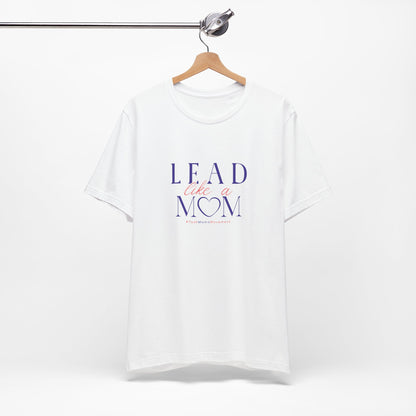 White t-shirt with 'Lead Like a Mom' text on a hanger against a white background