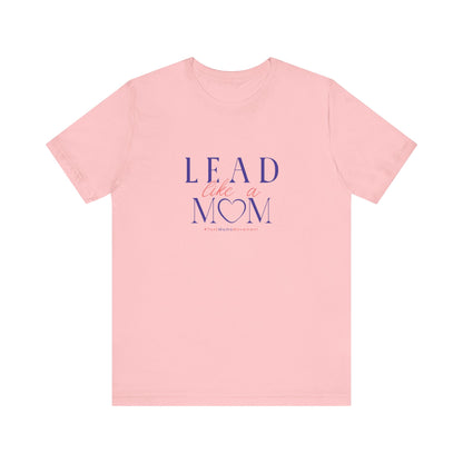 Pink t-shirt with 'Lead Like a Mom' text on a white background