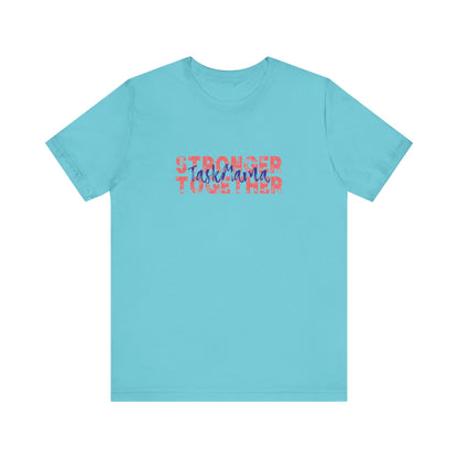 Light blue t-shirt with colorful text on a white background
