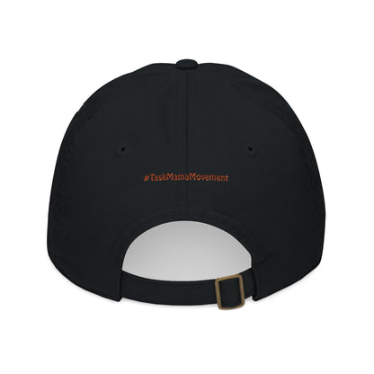 Black cap with '#TaskMamaMovement' text on a white background