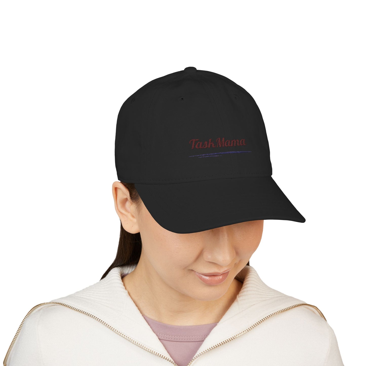 Person wearing a black cap with text on a white background
