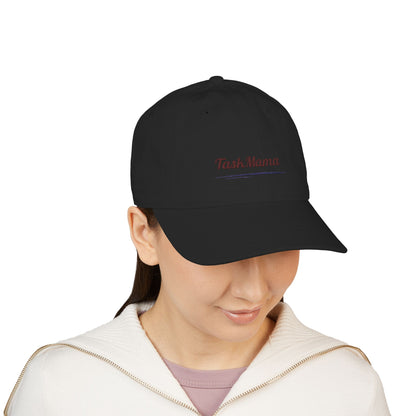 Person wearing a black cap with text on a white background
