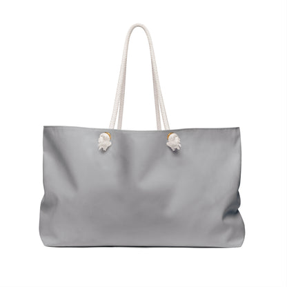 Gray tote bag with white handles on a white background