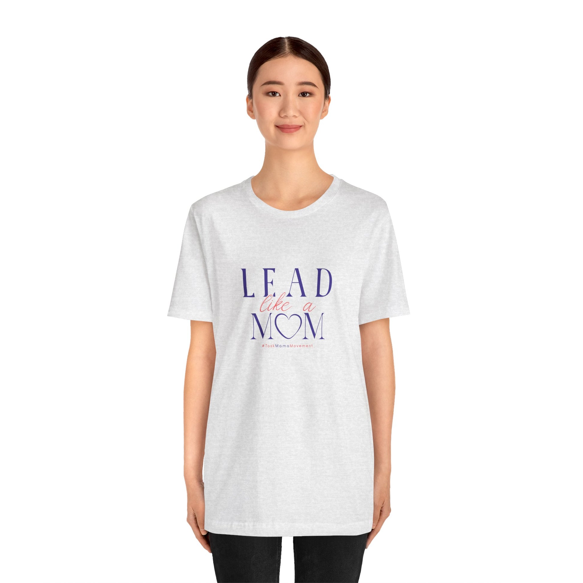 Person wearing a white t-shirt with 'Lead Like a Mom' text on a white background