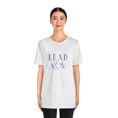 Person wearing a white t-shirt with 'Lead Like a Mom' text on a white background