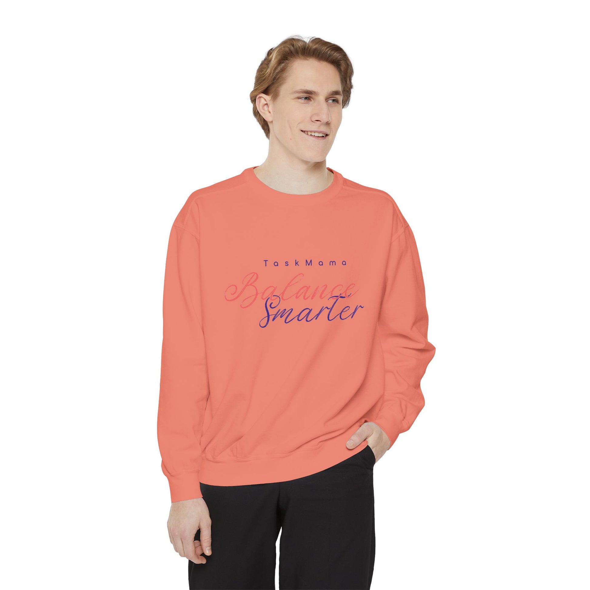 Person wearing a coral sweatshirt with text on a white background