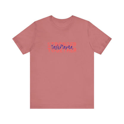 Pink t-shirt with 'TaskMarta' text on a white background