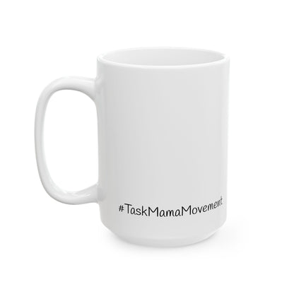 White mug with '#TaskMamaMovement' text on a white background